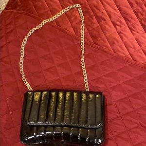 Gold chain black purse